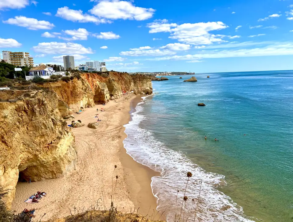 The golden cliffs and arches of Praia da Marinha on the central Algarve coast